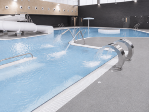 Piscina interior recreativa con tobogán y chorros de agua, construcción de piscinas municipales.