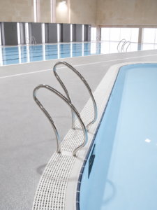 Piscina cubierta de competición Alpe Pools con escaleras y carriles de natación.